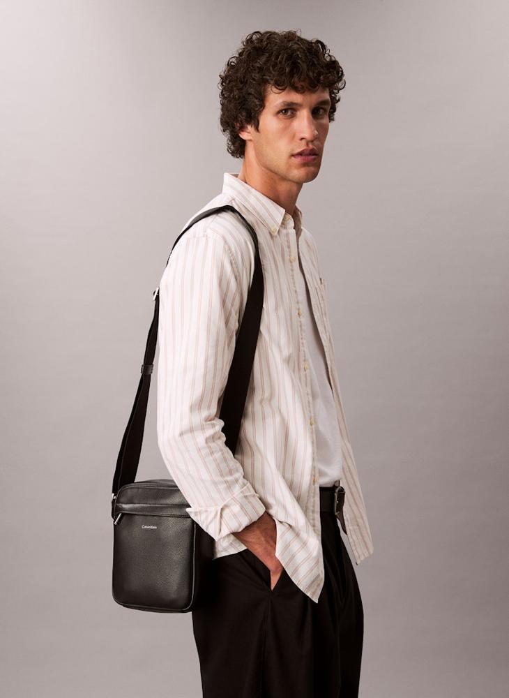 Raised Messenger Bag