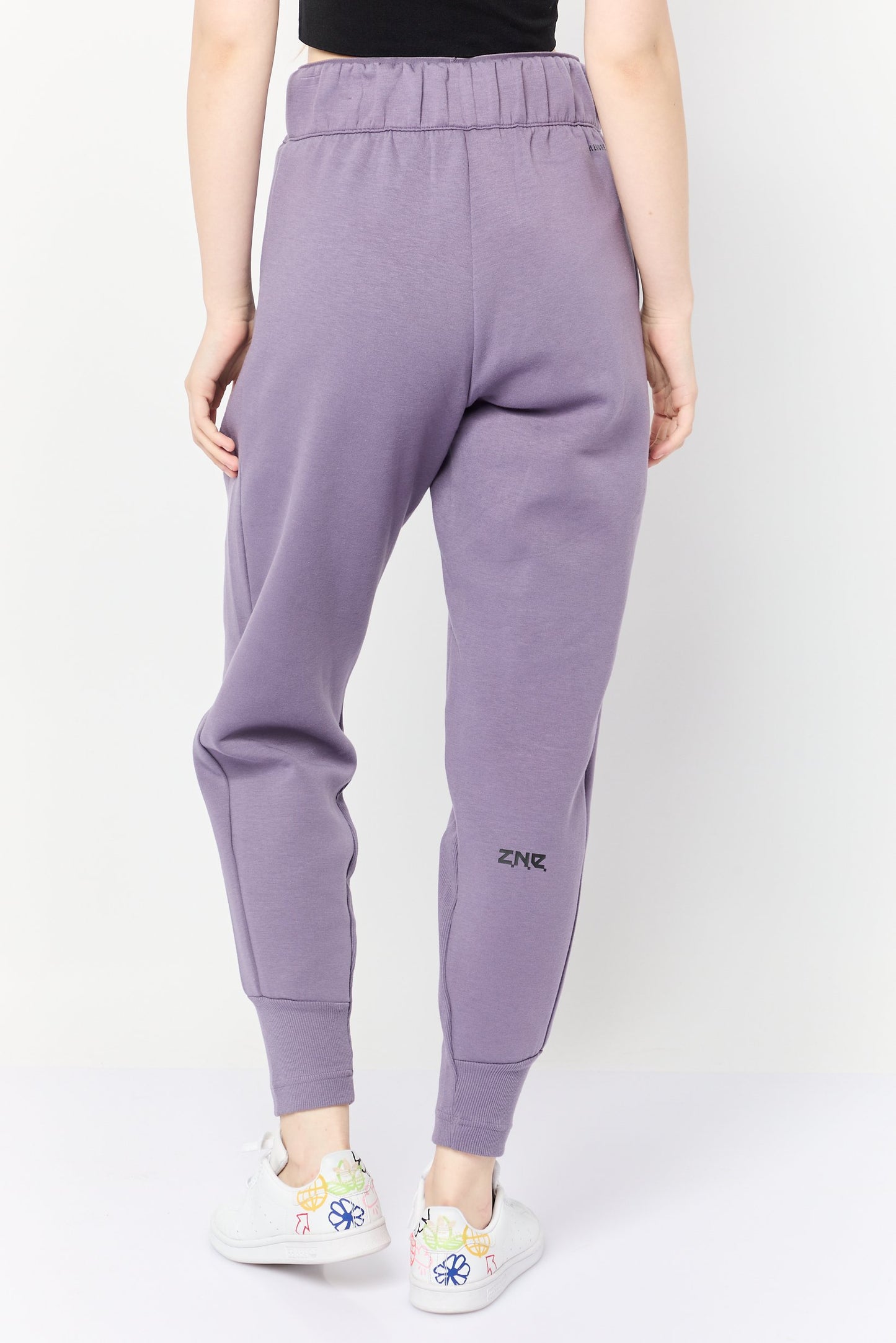 Women Sportswear Fit Brand Logo Outdoor Sweatpants, Purple