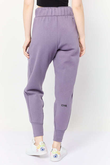 Women Sportswear Fit Brand Logo Outdoor Sweatpants, Purple