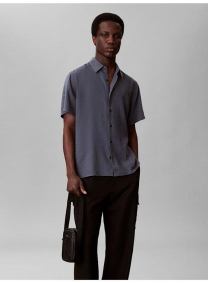 Emblem AOP Embossed Slim Reporter
